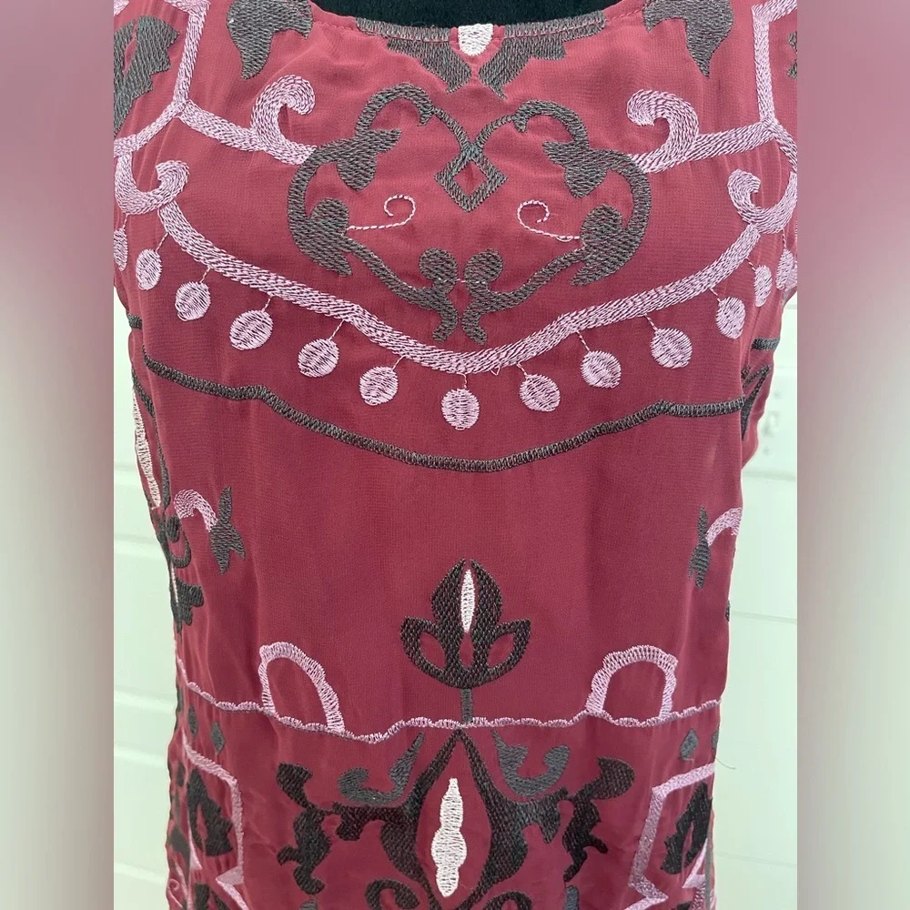 Octavia sleeveless embroidered tunic top. Fully lined. In new like condition.LG